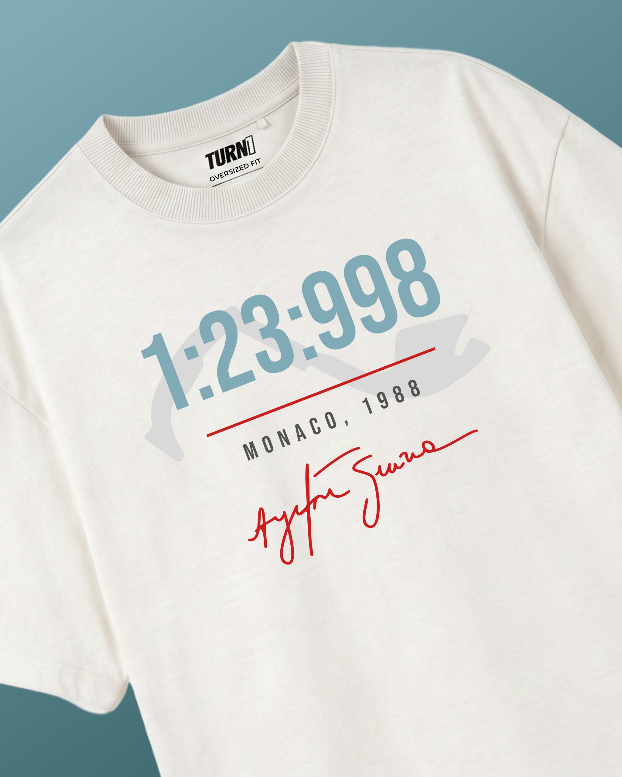 Turn1 India F1 Tshirt Off White Unisex Oversized T-shirt: Ayrton Senna fan graphic tshirt featuring Ayrton Senna’s legendary Monaco GP qualifying lap of 1988. 