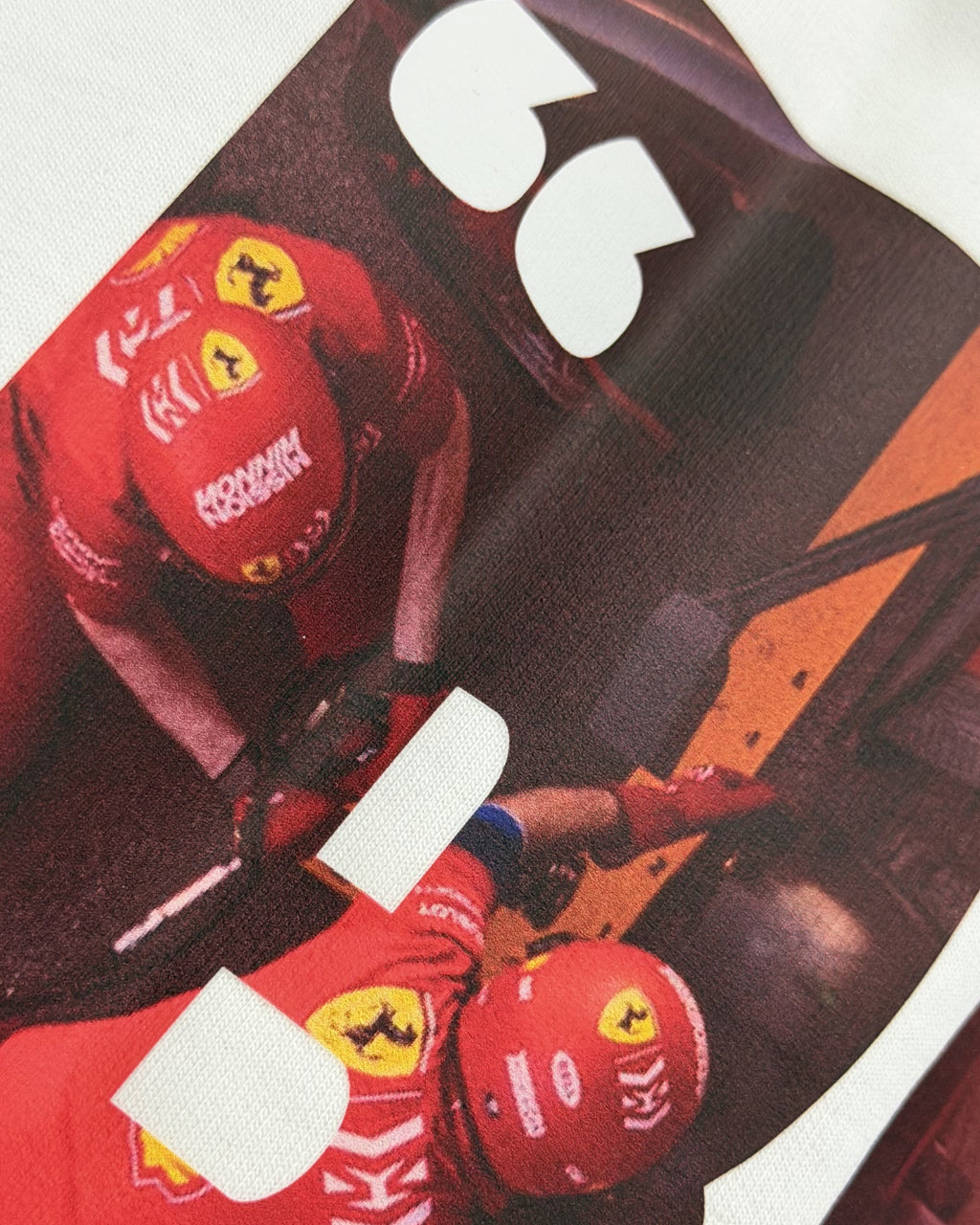 
Closeup of F1 Turn1 India off white oversized unisex tshirt - fan graphic of F1 quote "Box Box" featuring Ferrari pitstop
Front print of 3 tyre compounds in Formula 1 cars - small, medium, hard