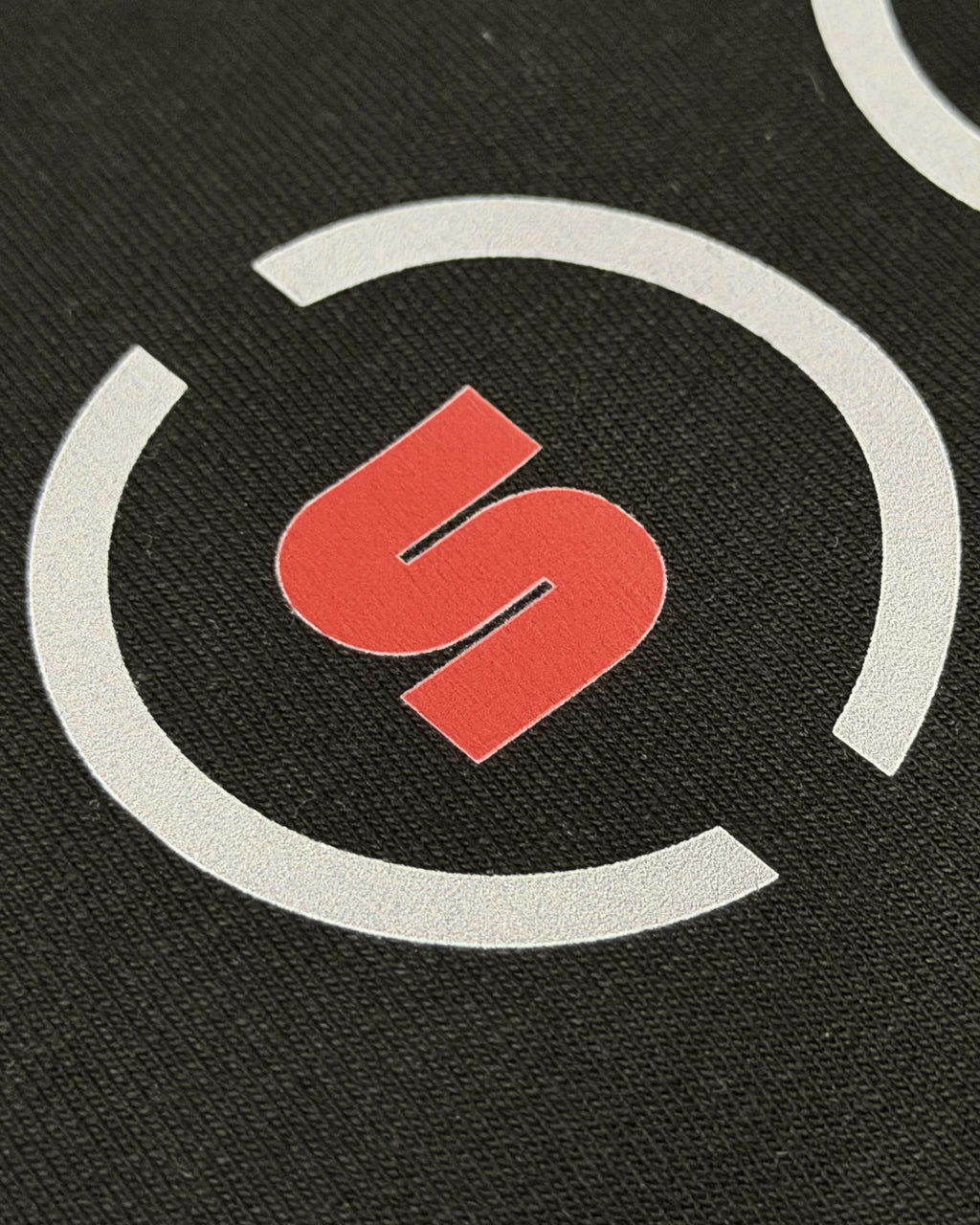 
Closeup of F1 Turn1 India black oversized unisex tshirt - fan graphic of F1 quote "Box Box" featuring Ferrari pitstop
Front print of 3 tyre compounds in Formula 1 cars - small, medium, hard