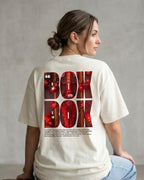 
Female model wearing F1 Turn1 India Off White oversized unisex tshirt - fan graphic of F1 quote "Box Box" featuring Ferrari pitstop
Front print of 3 tyre compounds in Formula 1 cars - small, medium, hard