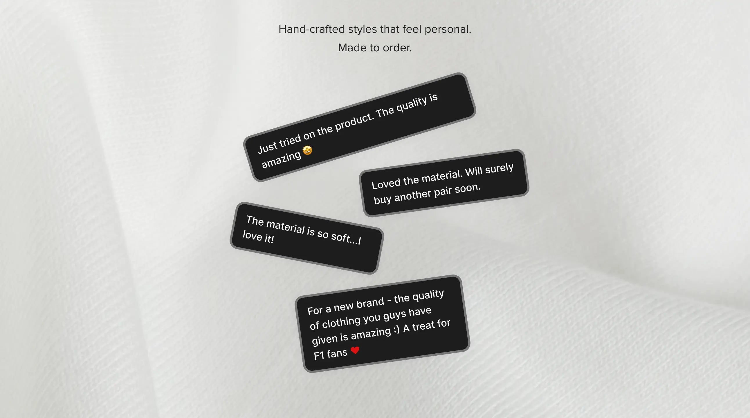 Black text labels on a white fabric background with real customer reviews on Turn1 t-shirts.