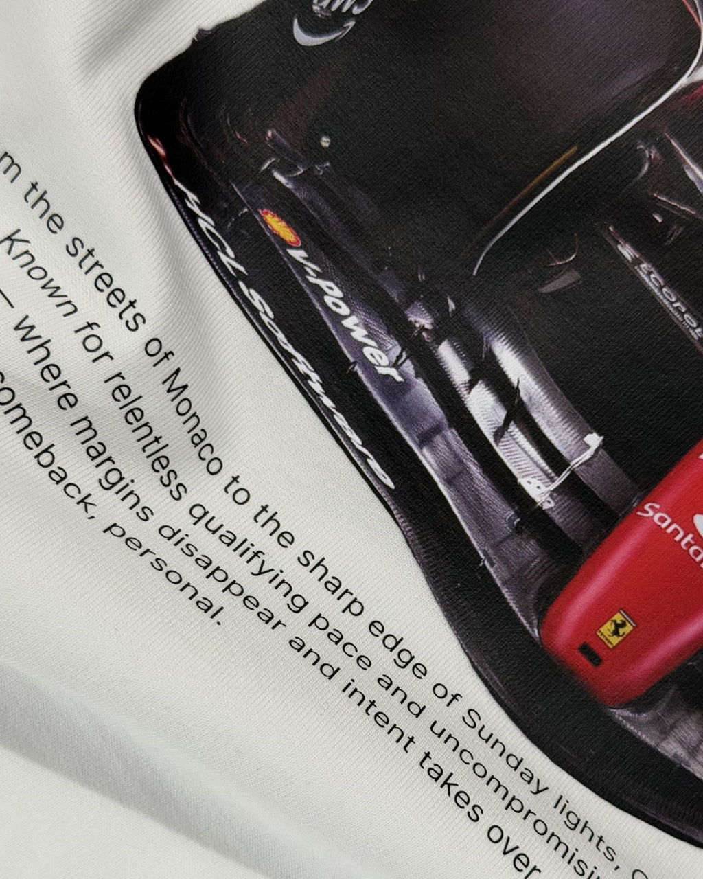 Closeup of F1 Turn1 India Off White Oversized Unisex Tshirt featuring fan graphic Charles Leclerc, current driver for Scuderia Ferrari F1 team. Tshirt features Charles Leclerc graphic, his number "16" and his Ferrari car.
Front print text "Plan C" in black.