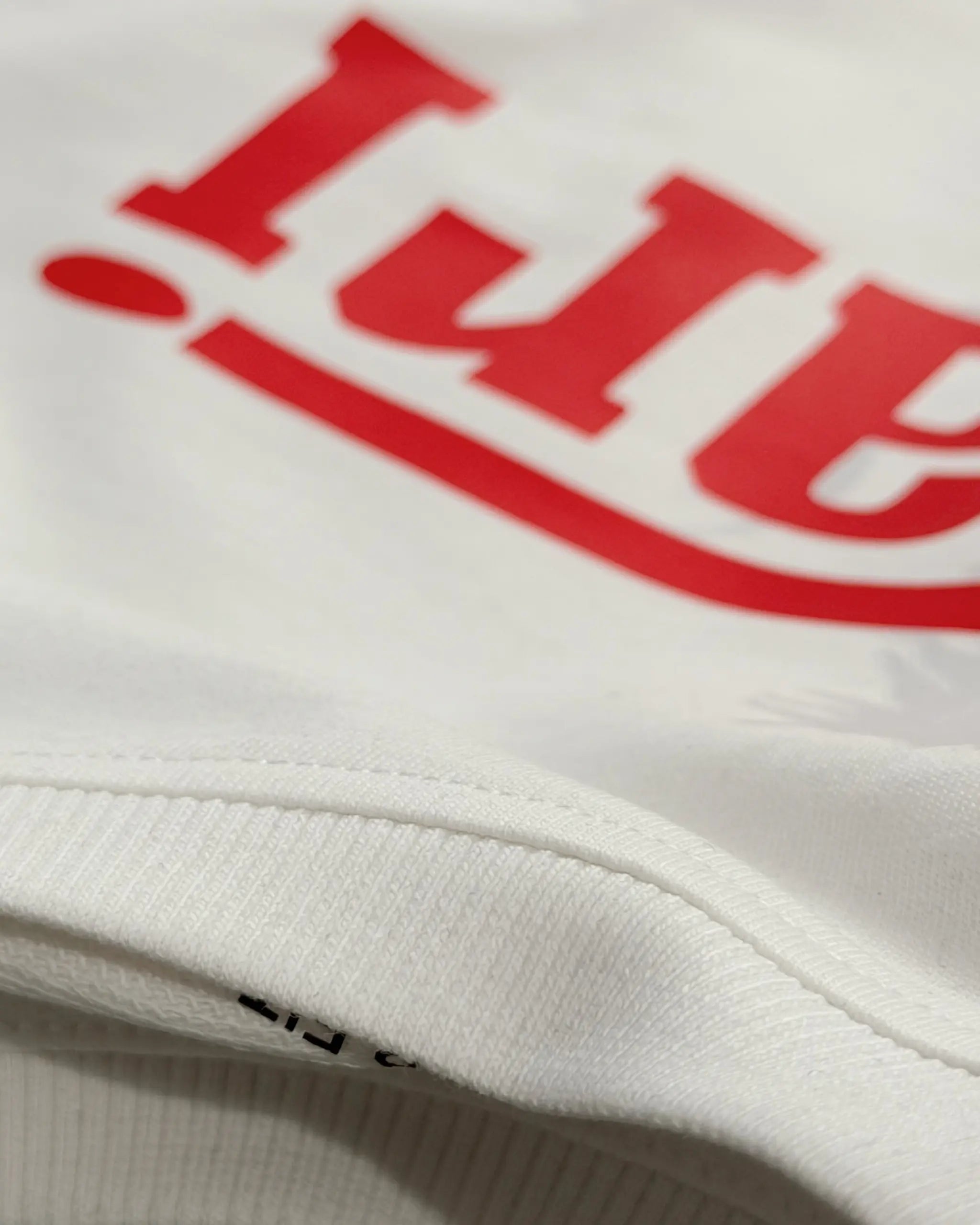 Closeup of Fabric and Print | Ferrari Red Wordmark Logo Classic Women Crop Top Colour White | Turn1 India