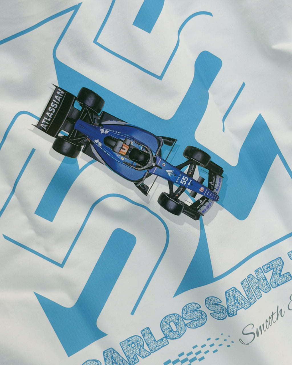 Close up of F1 Turn1 India Off White oversized unisex tshirt - fan graphic of Carlos Sainz Smooth Operator, Williams F1 racing team driver and featuring his Car Number 55.