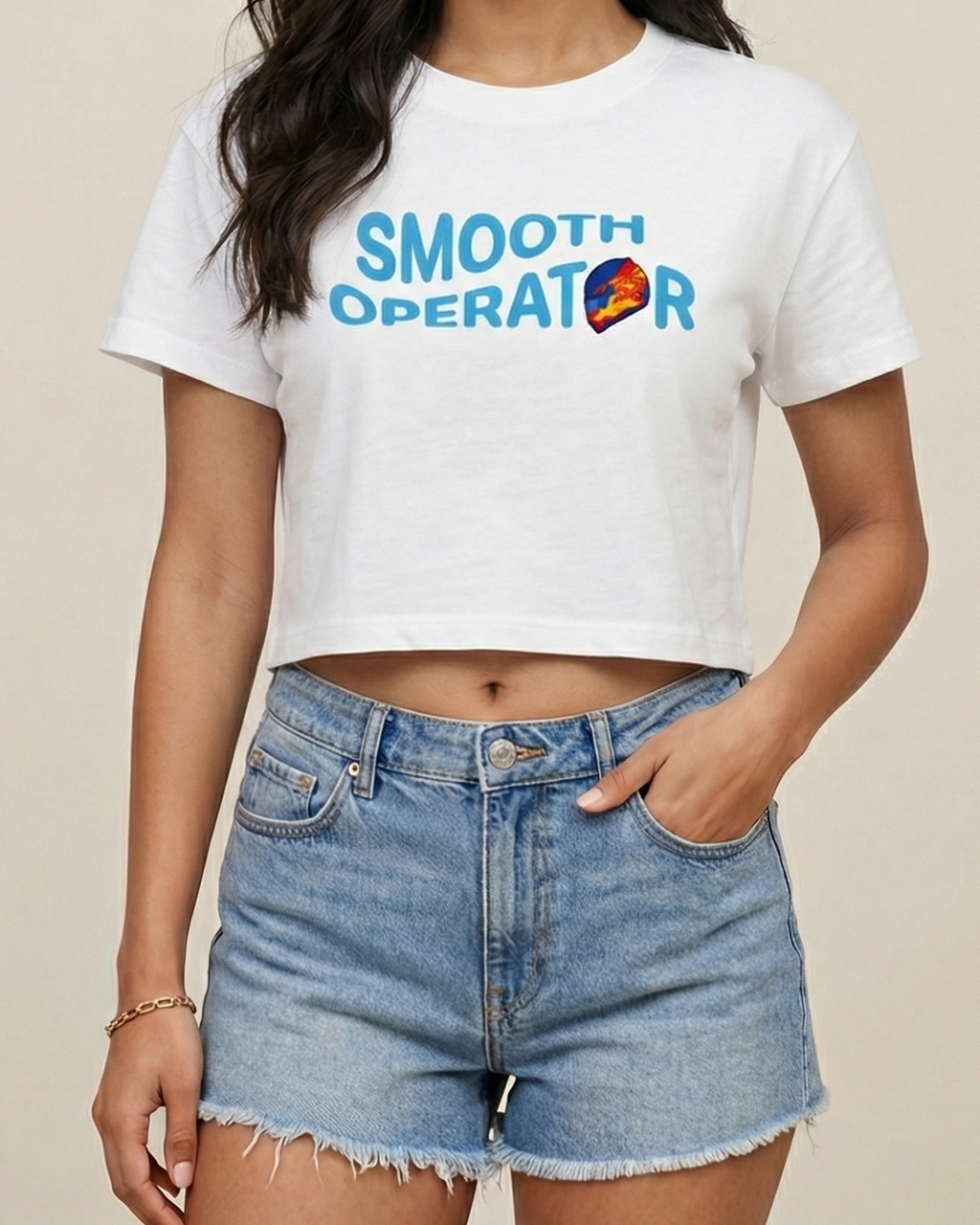 Model wearing F1 Turn1 India White crop top with “SMOOTH OPERATOR” graphic on the front based on driver Carlos Sainz Jr - driver of Williams F1 Racing team