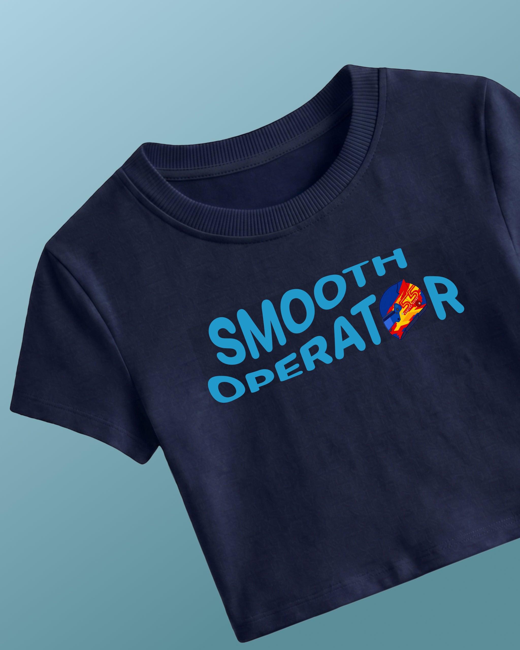 F1 Turn1 India Navy Blue crop top with “SMOOTH OPERATOR” graphic on the front based on driver Carlos Sainz Jr - driver of Williams F1 Racing team