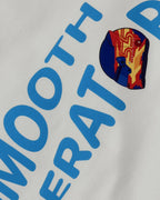 Close-up of F1 Turn1 India White crop top with “SMOOTH OPERATOR” graphic on the front based on driver Carlos Sainz Jr - driver of Williams F1 Racing team