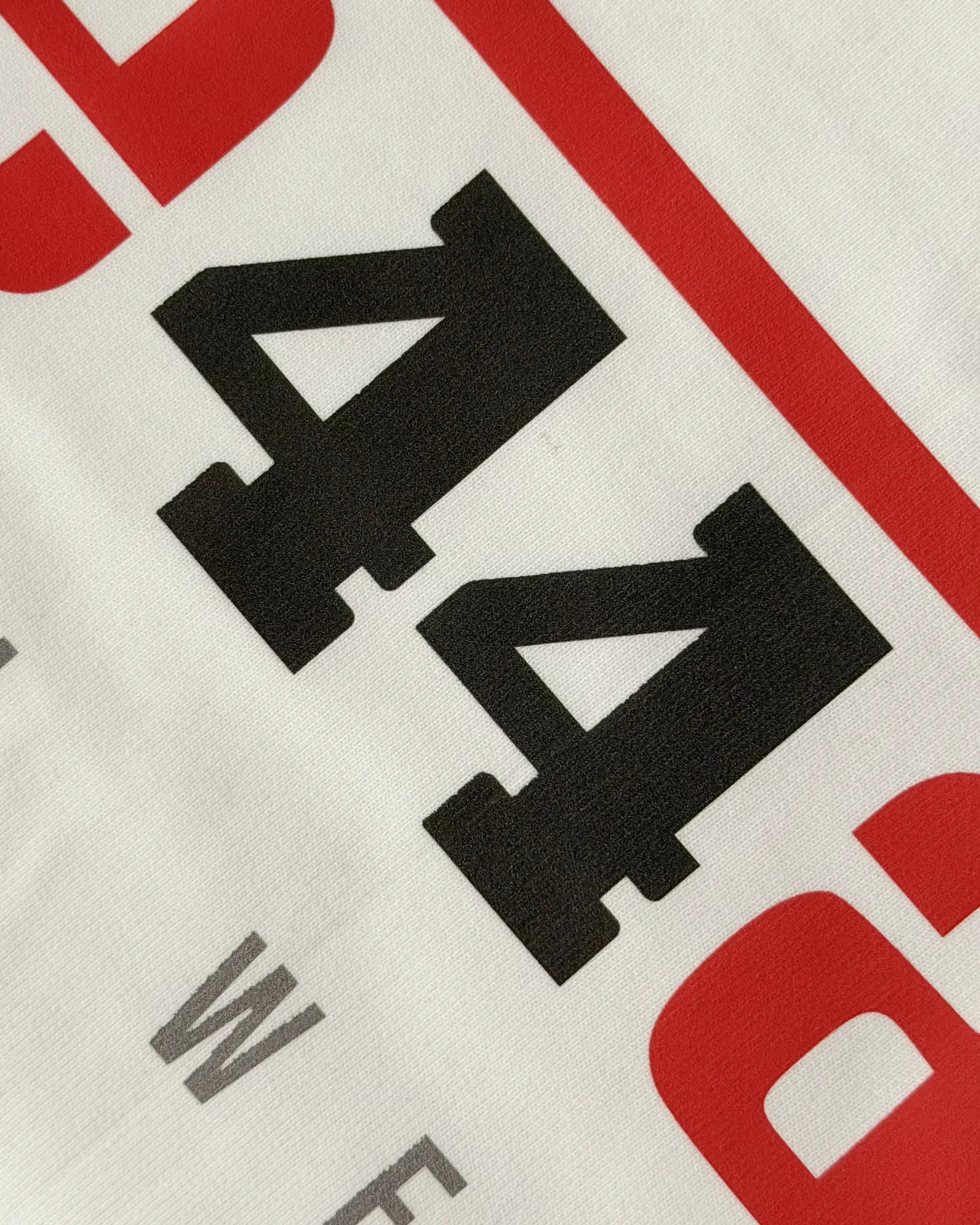 Close-up Image of Fabric and Print - Ferrari F1 Unisex Oversized T-shirt Off-White | Turn1 India