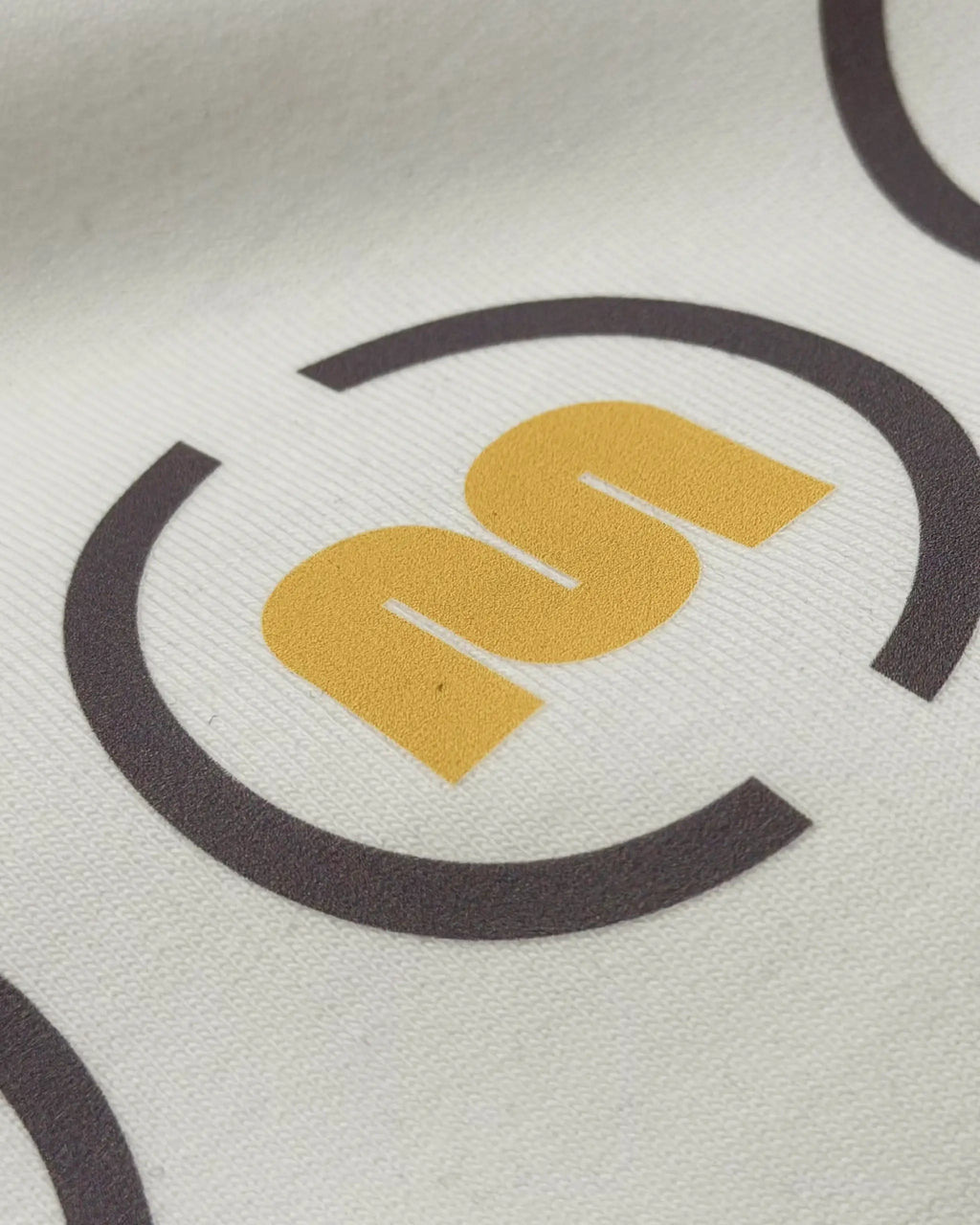 Close-up Image of Fabric and Print - Box Box Pit Stop Formula 1 F1 Oversized Unisex T-shirt Off-White Showing Ferrari Pitstop with Charles Leclerc and F1 Tyre Compounds | Turn1 India