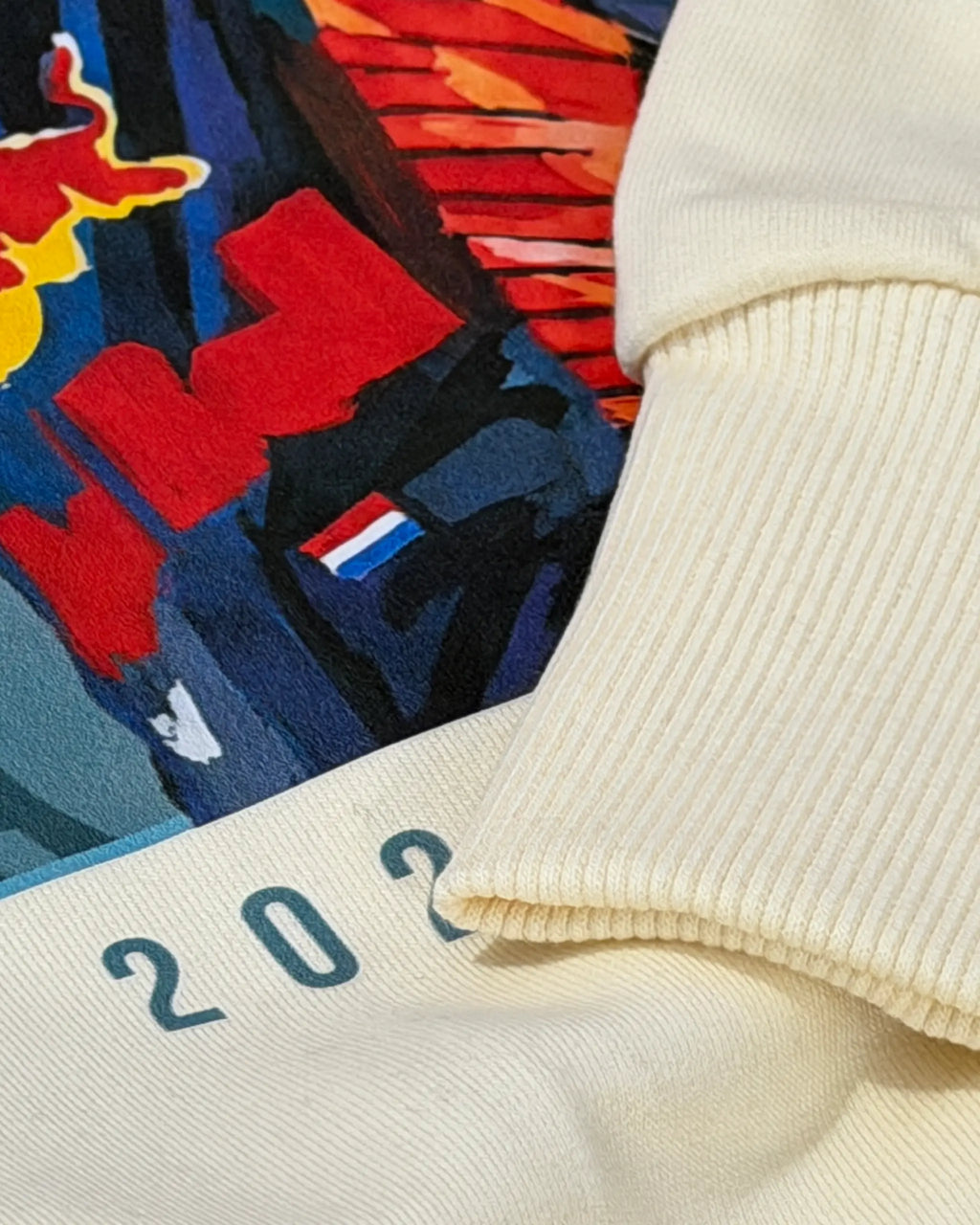 Close-up Image of Fabric and Print  Max Verstappen Formula 1 Hoodie Unisex 320 GSM Fleece F1 Sweatshirt Cream Colour Front View - Turn1 India