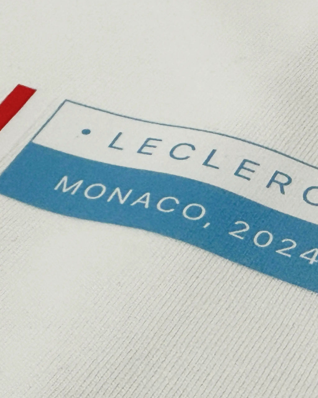 Close-up image of Fabric and Print  Charles Leclerc Monaco Edition F1 Unisex Oversized T-shirt Off-White | Turn1 India