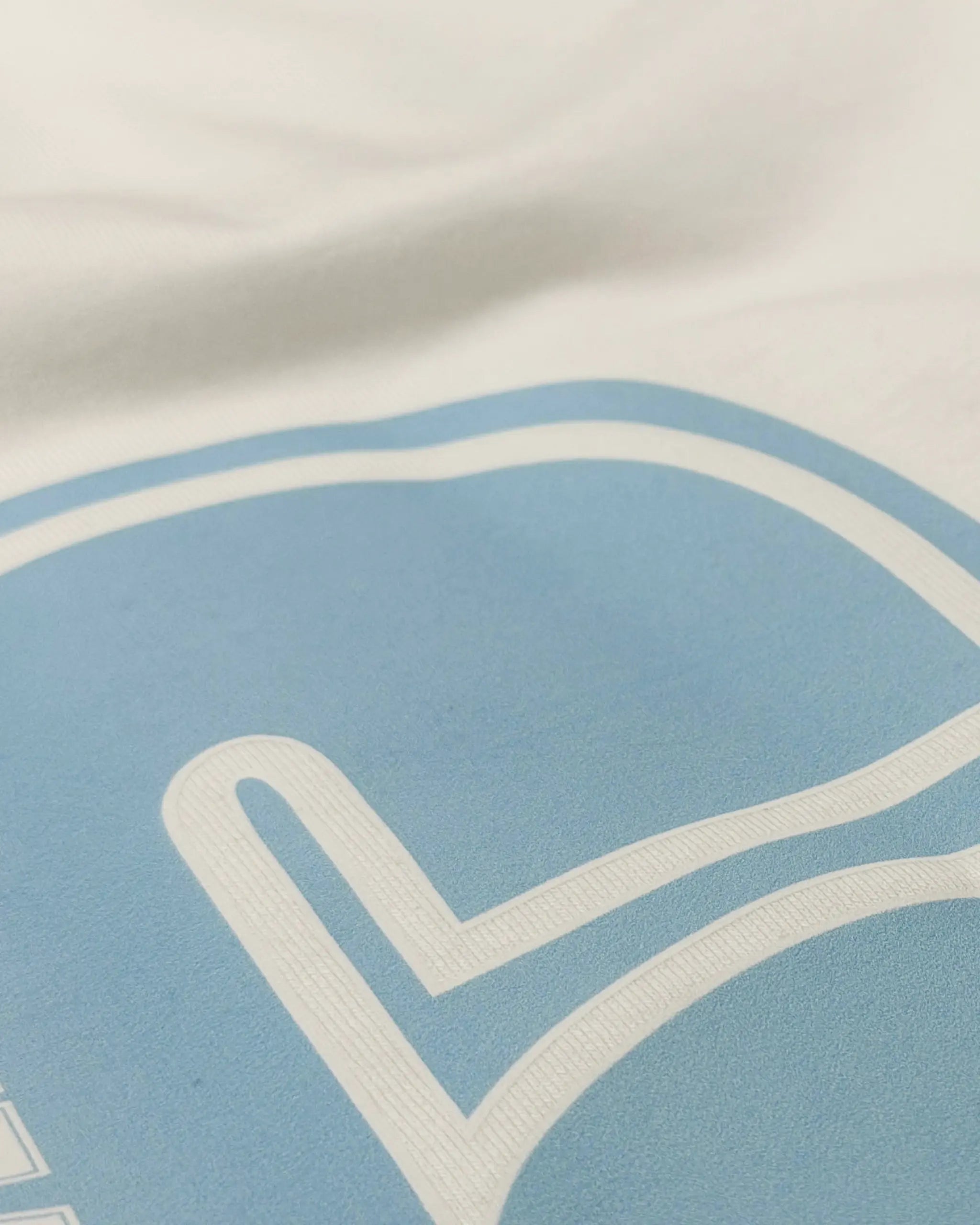 Close-up image of Fabric and Print  Charles Leclerc Monaco Edition F1 Unisex Oversized T-shirt Off-White | Turn1 India