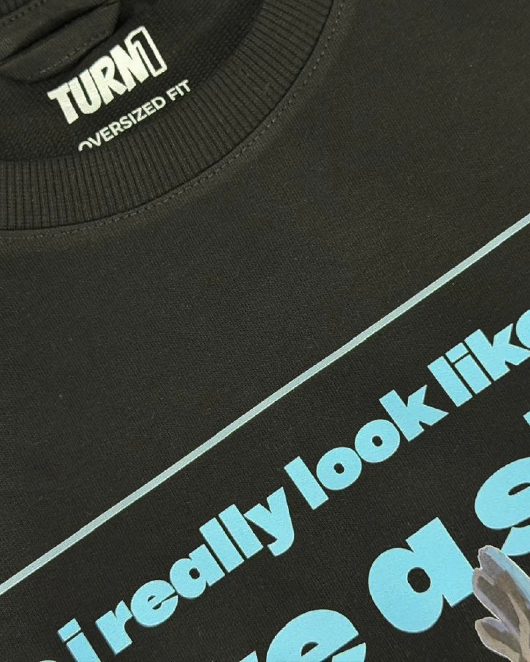 Close-up Image of Fabric and Print - Max Verstappen Attitude Don't Give a Sh*t F1 Unisex Oversized T-shirt Black Front View | Turn1 India