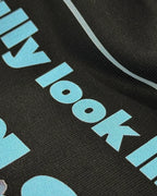 Close-up Image of Fabric and Print - Max Verstappen Attitude Don't Give a Sh*t F1 Unisex Oversized T-shirt Black Front View | Turn1 India