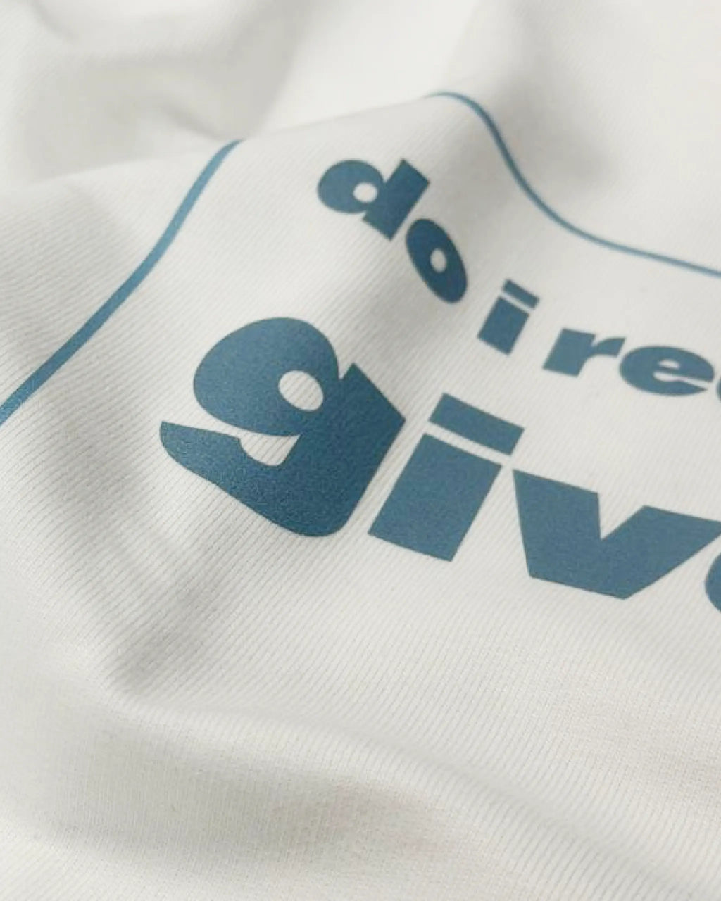 Close-up Image of Fabric and Print - Max Verstappen Attitude Don't Give a Sh*t F1 Unisex Oversized T-shirt Off-White Front View | Turn1 India