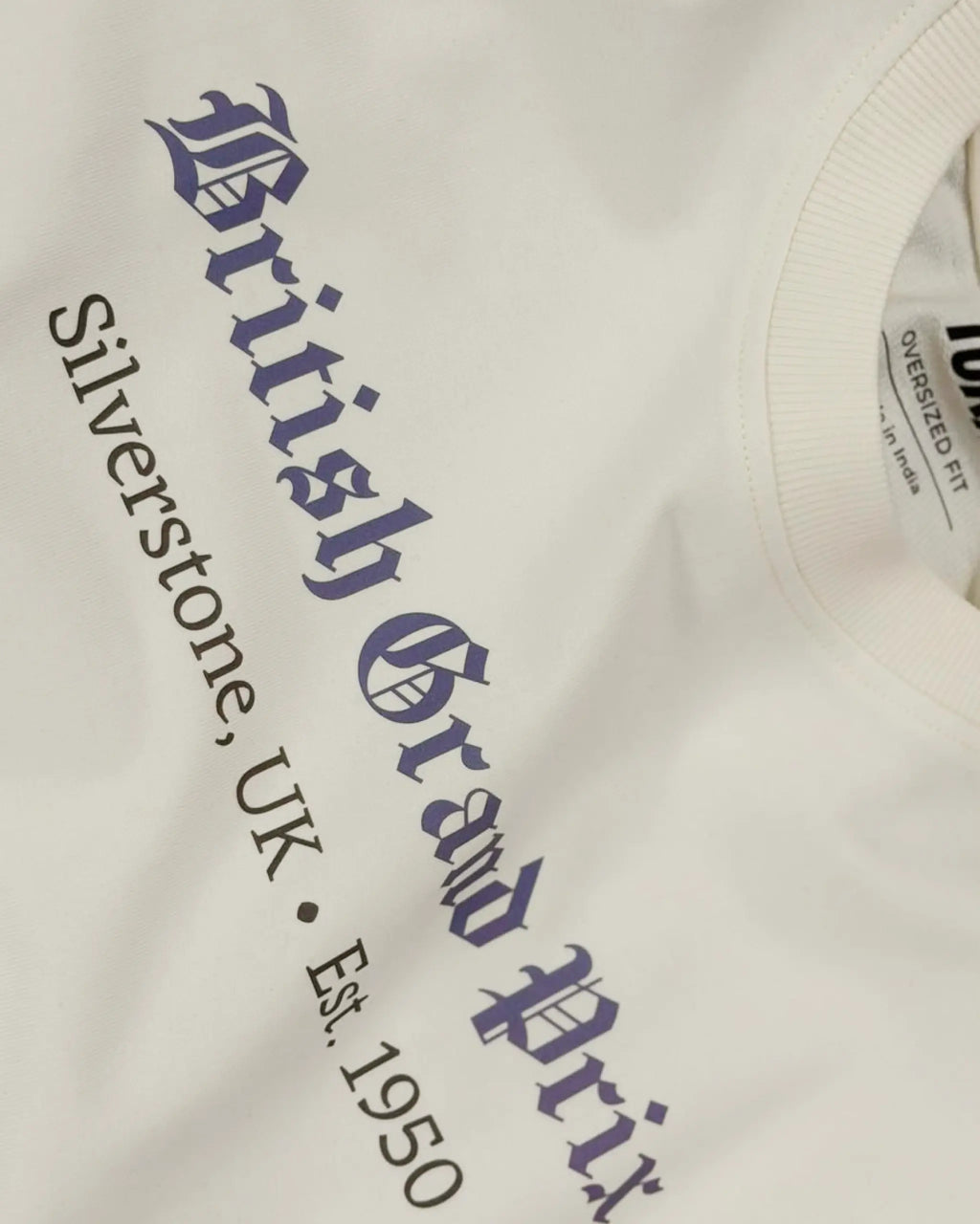 Close-up of Fabric and Print - British Grand Prix Circuit Silverstone F1 Unisex Oversized T-shirt Off-White | Turn1 India