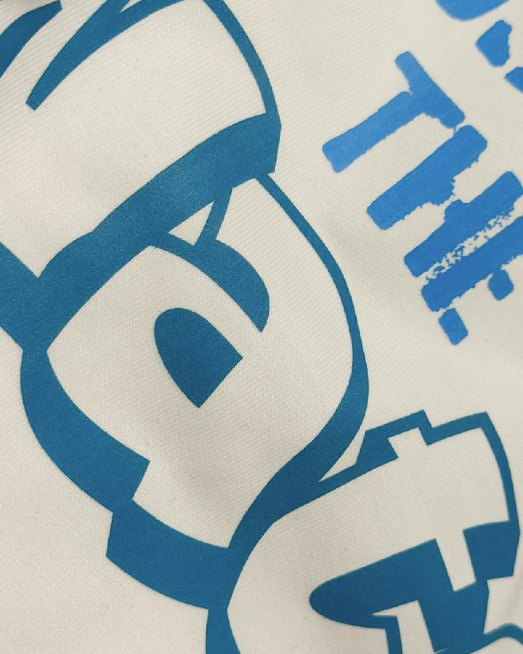Close-up of Fabric and Print - Charles Leclerc Ferrari Must Be The Water Unisex Oversized T-shirt Off-White | Turn1 India