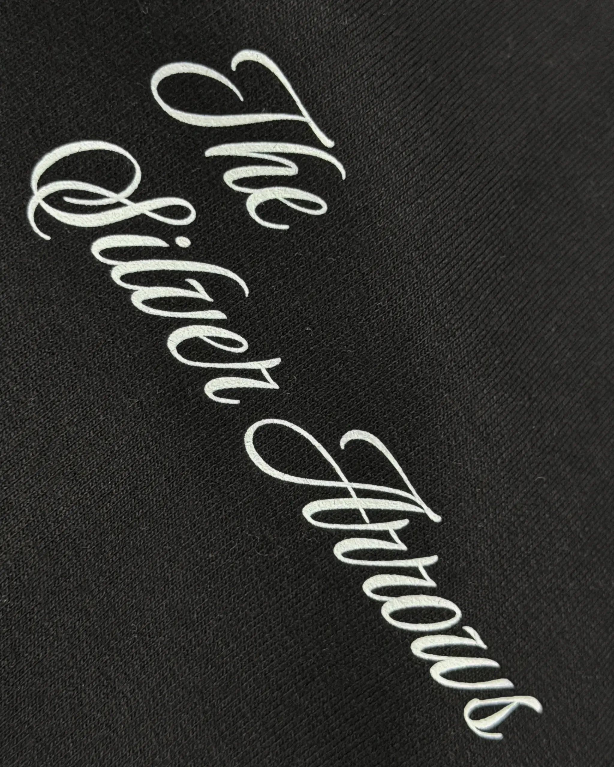 Close-up of Fabric and Print - Kimi Antonelli F1 Unisex Oversized T-shirt Black | Turn1 India