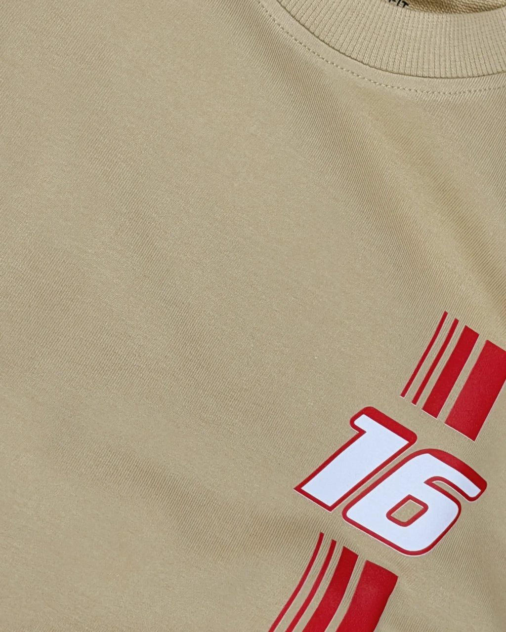 Close-up of Fabric and Print - Charles Leclerc Ferrari F1 Unisex Oversized T-shirt Beige | Turn1 India