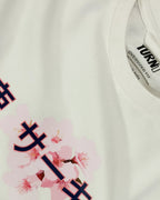 Closeup image of fabric and print | Suzuka Circuit Japan Grand Prix F1 Unisex Oversized Graphic T-shirt Off-White Side View | Turn1 India
