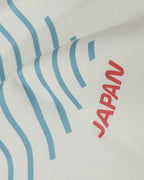 Close-up image of fabric and print | Suzuka Circuit Japan Grand Prix F1 Unisex Oversized Graphic T-shirt Off-White Side View | Turn1 India
