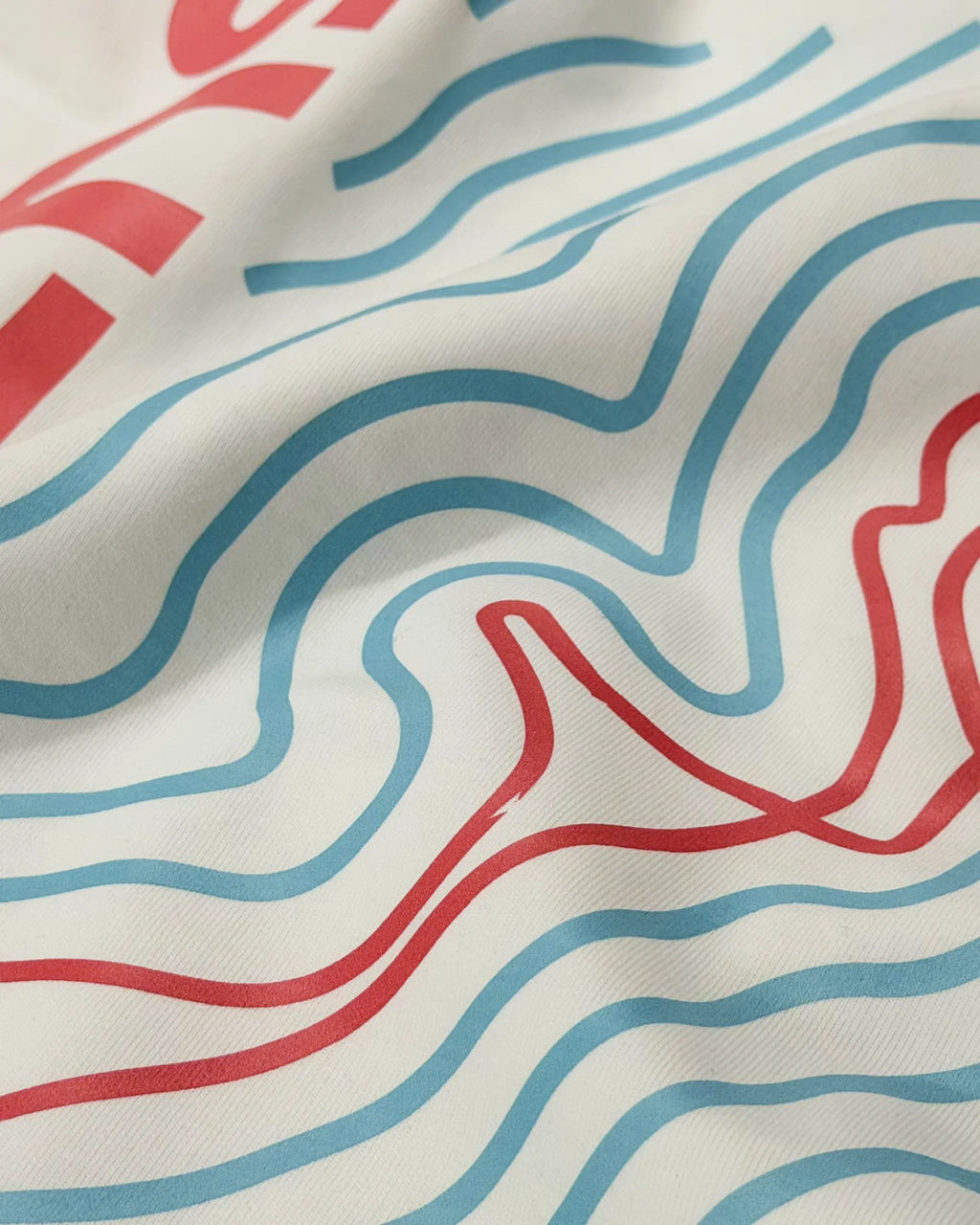 Closeup image of fabric and print | Suzuka Circuit Japan Grand Prix F1 Unisex Oversized Graphic T-shirt Off-White Side View | Turn1 India