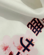Closeup image of fabric and print | Suzuka Circuit Japan Grand Prix F1 Unisex Oversized Graphic T-shirt Off-White Side View | Turn1 India