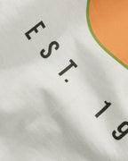 Closeup image of fabric and print Papaya Club McLaren F1 Unisex Oversized T-shirt Off-White Front View | Turn1 India