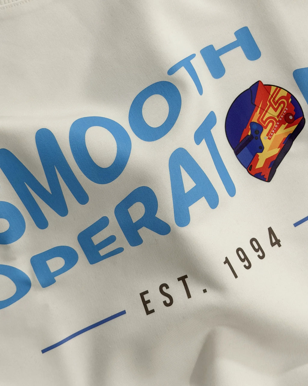 Closeup of Carlos Sainz Smooth Operator F1 Unisex Oversized T-shirt Off-White | Turn1 India