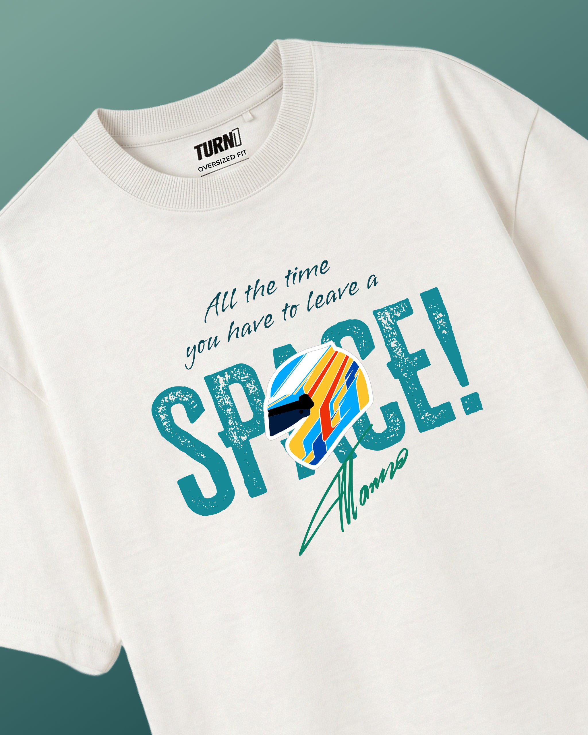 Off White oversized unisex tshirt by Turn 1, an F1 apparel brand in India - fan graphic tee of Fernando Alonso, ex Mclaren Racing and Scuderia Ferrari F1 driver. Tshirt's front print features Fernando Alonso's signature, helmet and his famous quote "All the time you have to leave a space". 