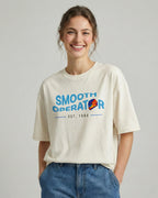 Female Model wearing Carlos_Sainz Smooth Operator F1 Unisex Oversized T-shirt Off-White Front View | Turn1 India