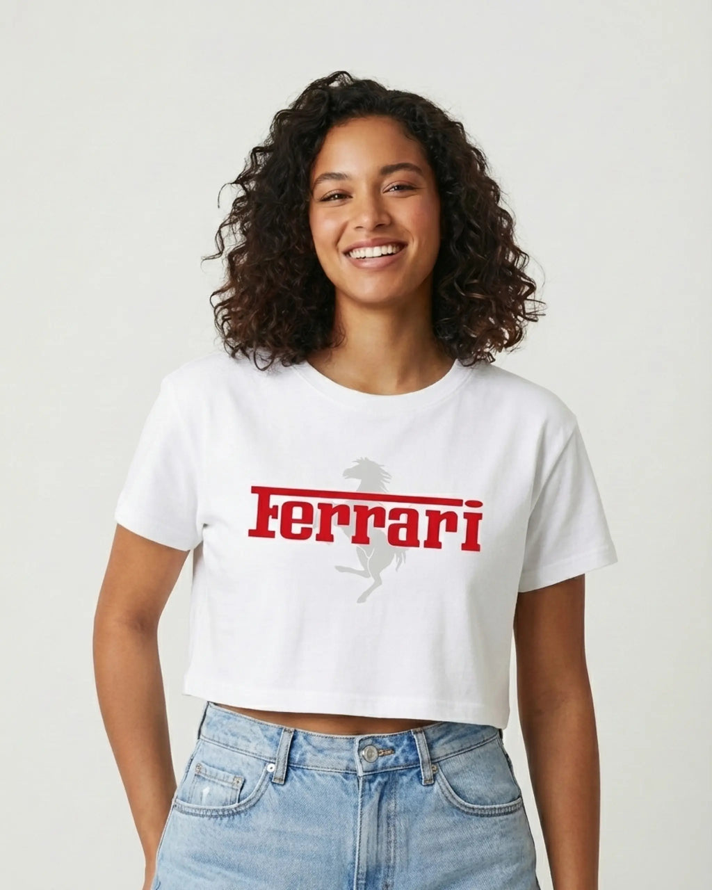 Female model wearing Ferrari Red Wordmark Logo Classic Women Crop Top Colour White Front View | Turn1 India
