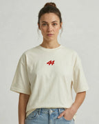 Female model wearing Lewis Hamilton Remember Who You Are Quote F1 Unisex Oversized T-shirt Off-White Front View | Turn1 India