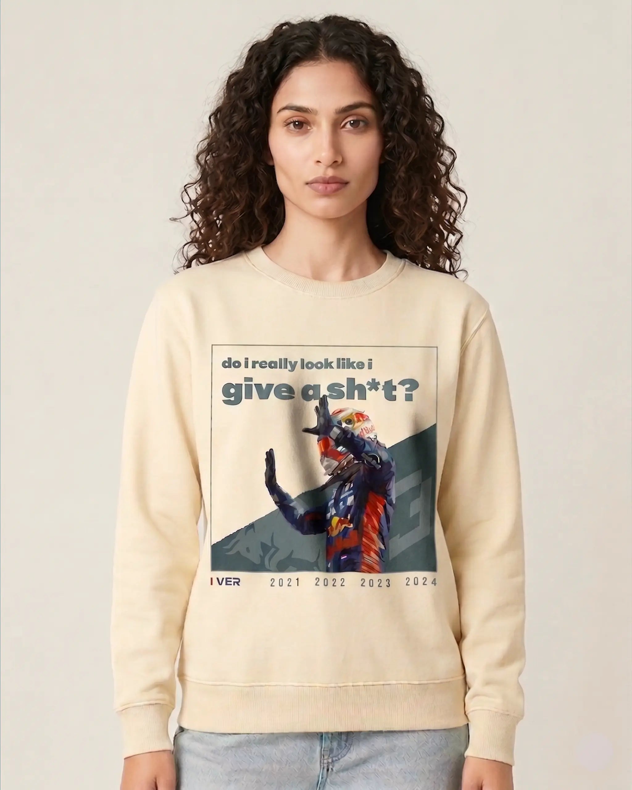 Female model wearing Max Verstappen Attitude F1 Unisex Sweatshirt Cream Colour Front View with crew neck and large Max Verstappen graphic print -Turn1 India