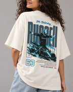 Female model woman girl wearing Formula 1 Tee - George Russell Mr. Saturday Graphic F1 T-shirt - Colour Off-White - Back View - Unisex Oversized Fit | Turn1 India