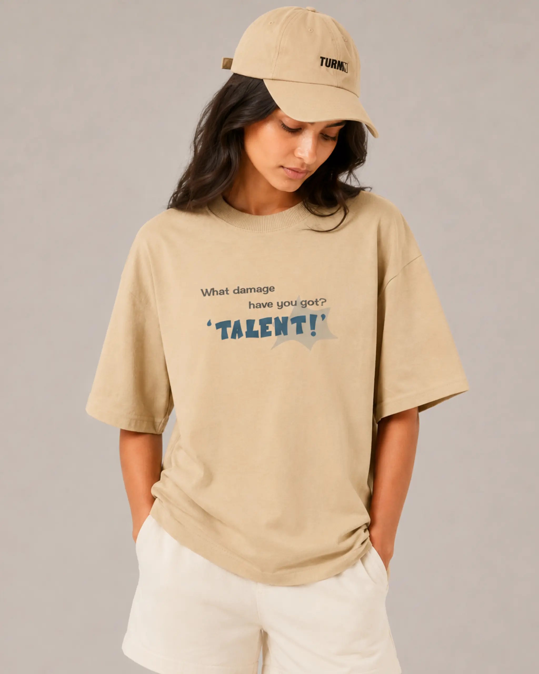 Female model woman wearing Lando Norris McLaren Talent Quote F1 Graphic T-shirt Beige Front View | Turn1 India