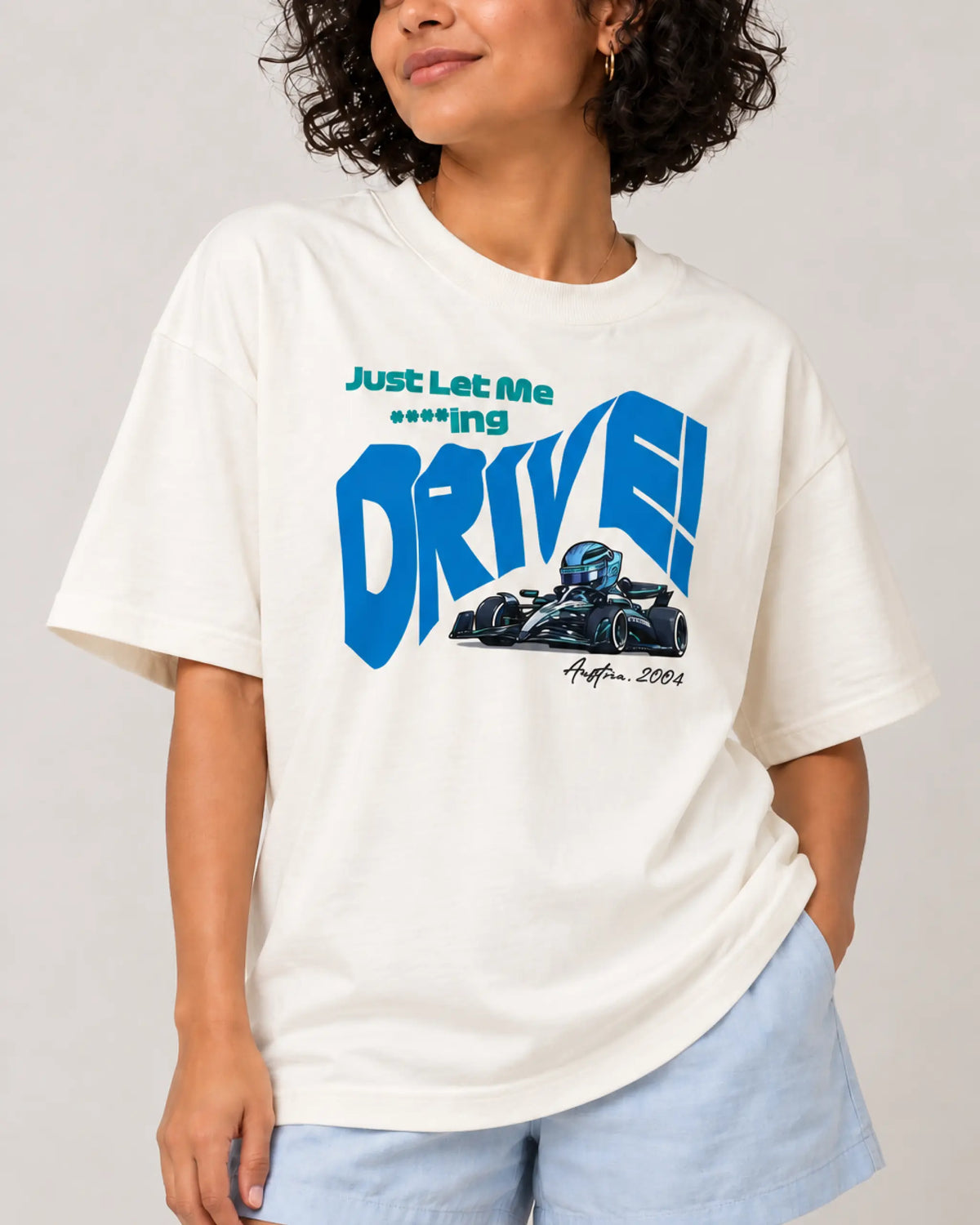 Formula 1 Tee | Female model woman girl wearing Let Me Drive George Russell F1 T-shirt | Off-white | Unisex Oversized Fit | Front View | Turn1 India