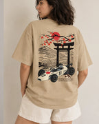 Female model woman wearing Tokyo Race Vibes F1 Unisex Oversized T-shirt Beige Back View | Turn1 India