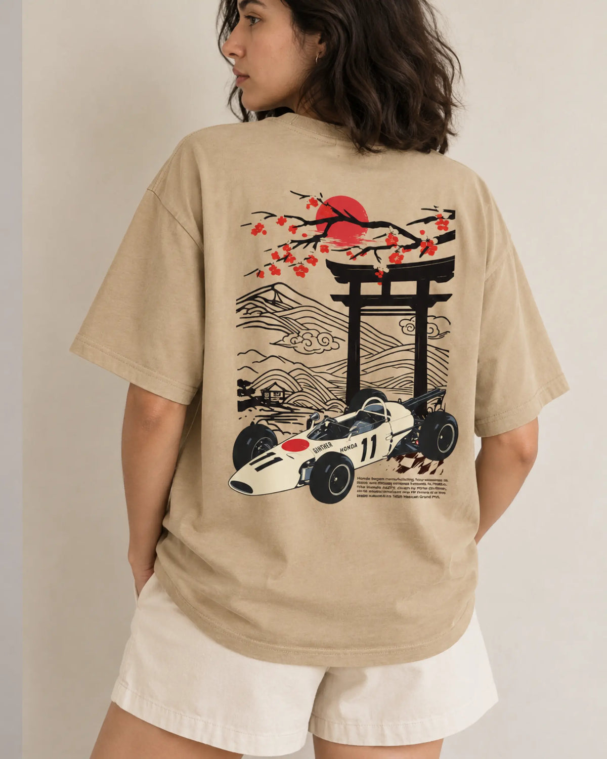 Female model woman wearing Tokyo Race Vibes F1 Unisex Oversized T-shirt Beige Back View | Turn1 India