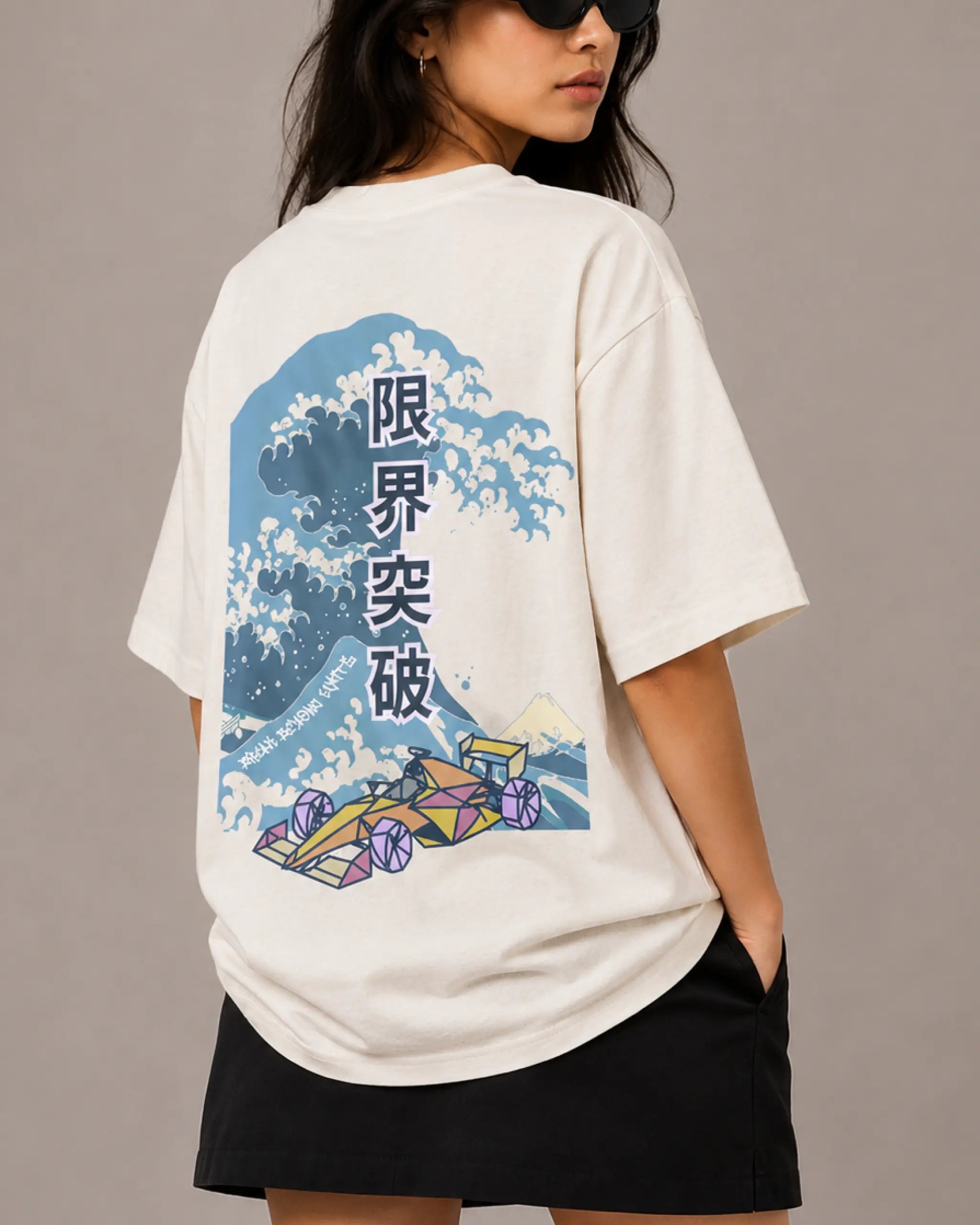 Female model woman wearing Tokyo Race Vibes F1 Unisex Oversized T-shirt Off-White Back View | Turn1 India