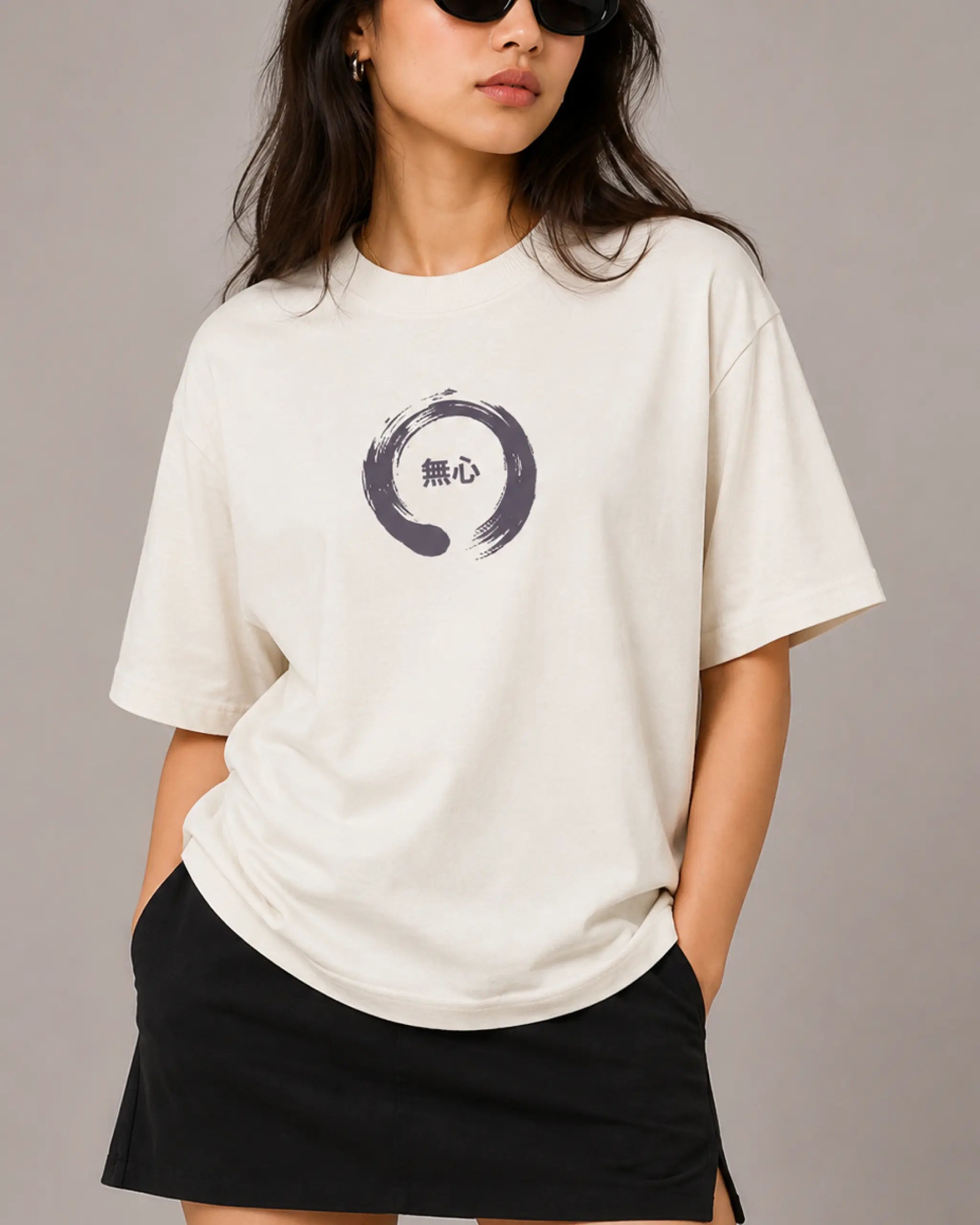 Female model woman wearing Tokyo Race Vibes F1 Unisex Oversized T-shirt Off-White Front View | Turn1 India