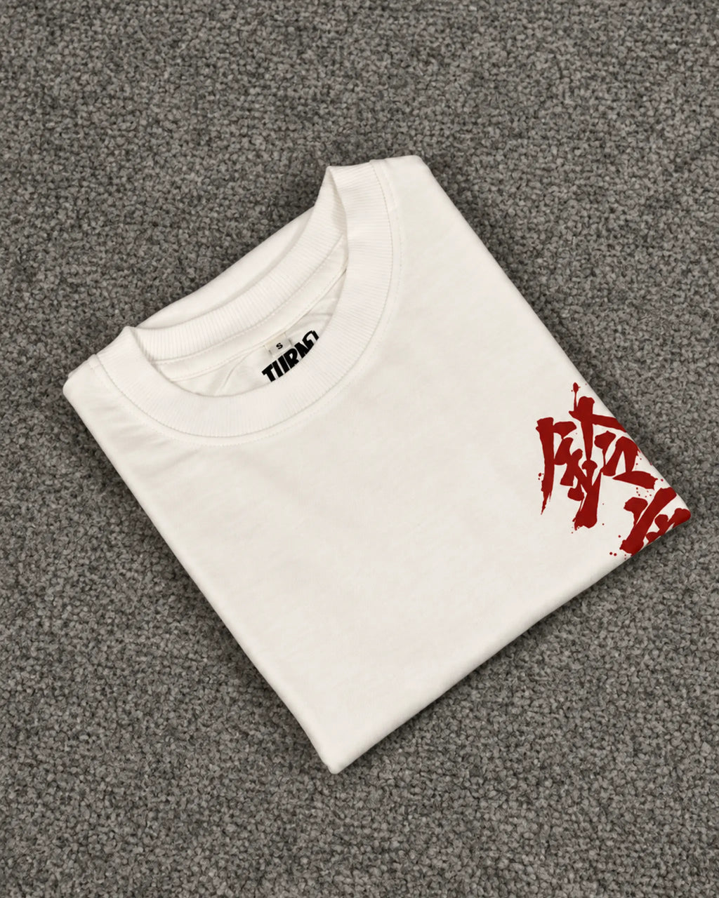 Folded shot of Suzuka Spirit Japan Formula 1 Racing Heritage Honda F1 Oversized T-Shirt Off-White | Turn1 India