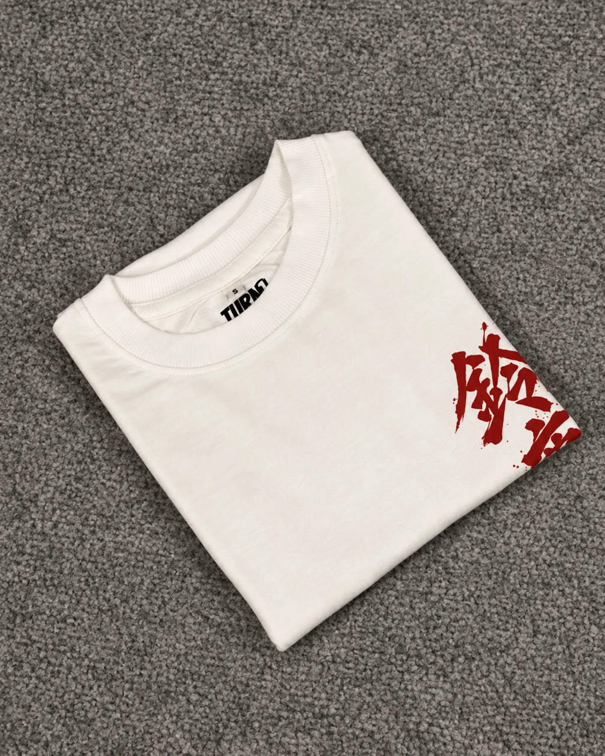Folded shot of Suzuka Spirit Japan Formula 1 Racing Heritage Honda F1 Oversized T-Shirt Off-White | Turn1 India