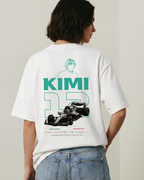 Female model wearing F1 Turn1 India Off White unisex oversized tshirt featuring Kimi Antonelli, Mercedes AMG Petronas F1 Team driver, his Mercedes F1 car and number 12.
Front print featuring text "Silver Arrows"