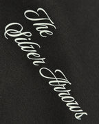 Closeup of F1 Turn1 India Black unisex oversized tshirt featuring Kimi Antonelli, Mercedes AMG Petronas F1 Team driver, his Mercedes F1 car and number 12.
Front print featuring text "The Silver Arrows"