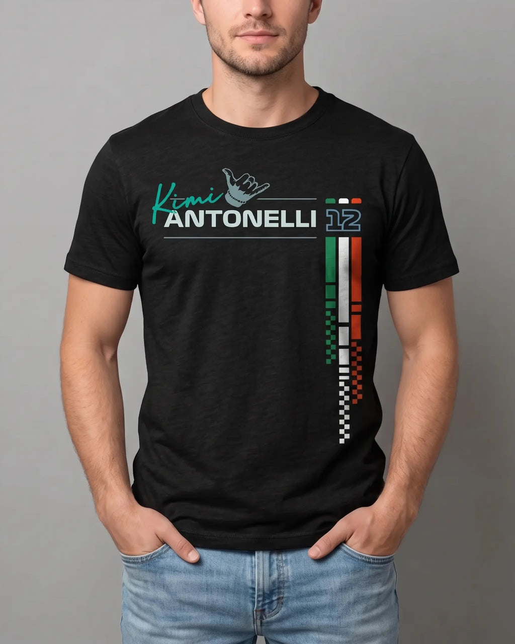 Male model wearing Black regular fit unisex F1 tshirt by Turn 1, an F1 apparel brand in India - fan graphic tee of Kimi Antonelli, Mercedes AMG Petronas Formula 1 driver. Tshirt's front print features Kimi Antonelli's signature hand move, his number 12 and colors of Italian flag. 