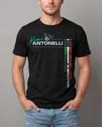 Male model wearing Black regular fit unisex F1 tshirt by Turn 1, an F1 apparel brand in India - fan graphic tee of Kimi Antonelli, Mercedes AMG Petronas Formula 1 driver. Tshirt's front print features Kimi Antonelli's signature hand move, his number 12 and colors of Italian flag. 