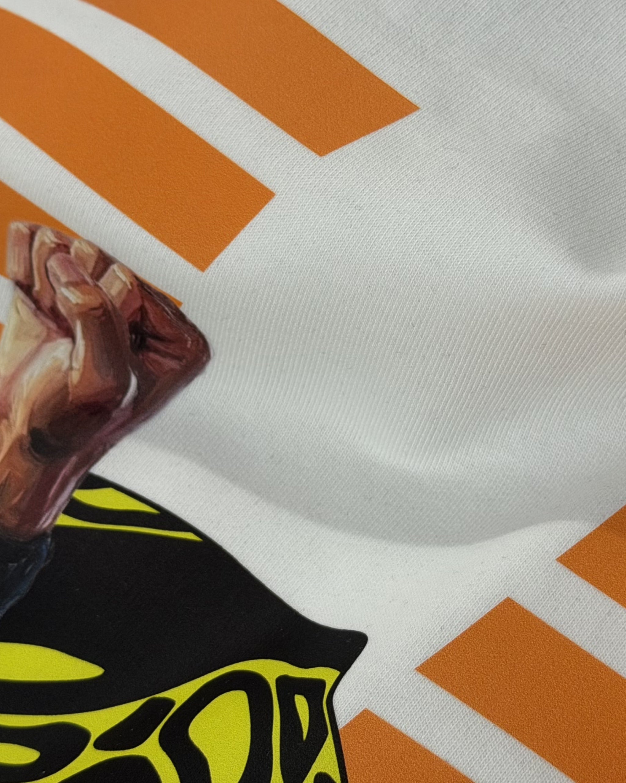 Close-up of Turn1 India Off White oversized unisex tshirt - fan graphic tee of Lando Norris, Mclaren Racing F1 driver. Tshirt's back print features Lando Norris, his helmet and text "2025 F1 World Champion".
Front print of tshirt features Mclaren Racing logo and Lando Norris' logo initials