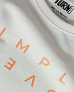 White fabric detail, orange lettering, ribbed collar with Regular Fit label on F1 White Women Crop Top by Turn 1 Brand, an F1 Apparel brand of India. Max Verrstappen fan crop top with quote "Simply Lovely" in orange font.