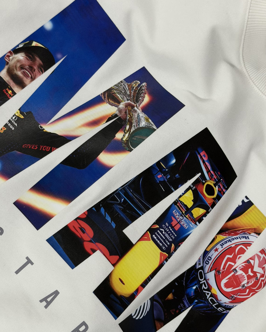 Closeup image of F1 Turn1 India Off White Oversized Unisex Tshirt featuring fan graphic Max Verstappen, driver for Redbull Racing F1 team and his various iconic race moments